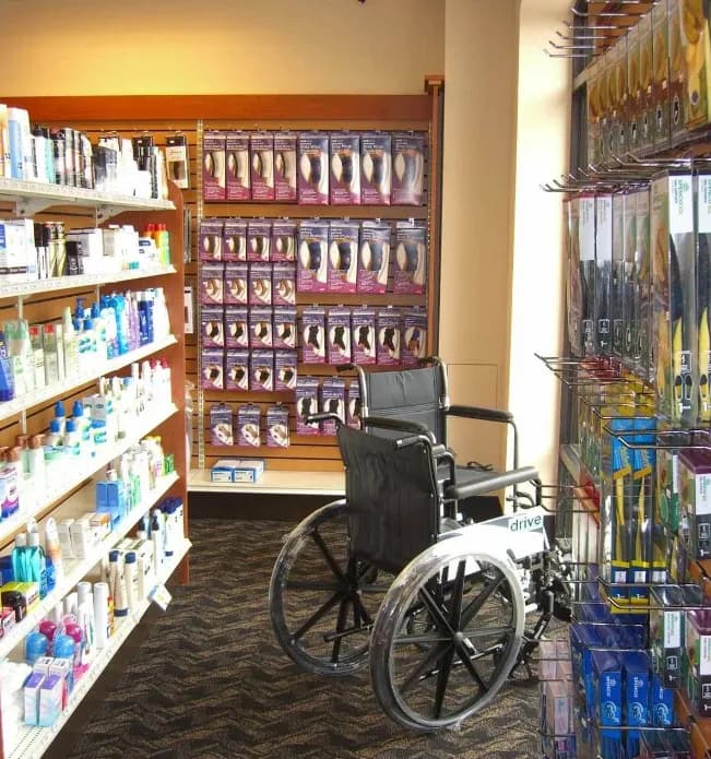 Pharmacist answering customer questions